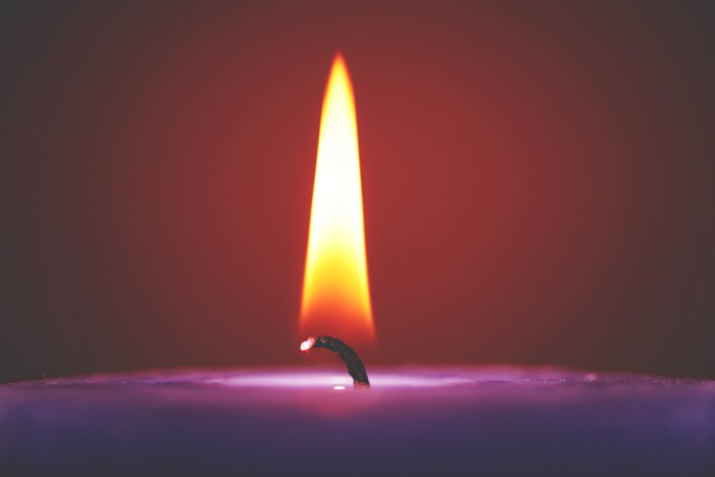 Selective focus of purple candle